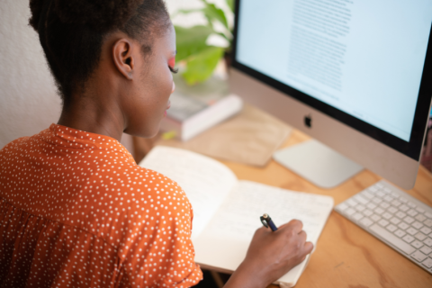 Young woman working at a computer