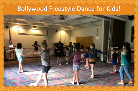 children lined up to learn a Bollywood dance routine