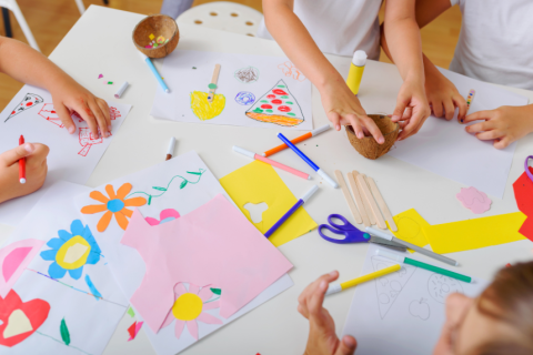 art supplies with hands